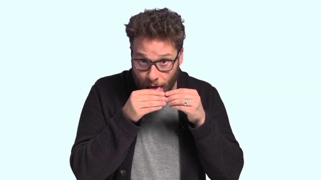 Seth Rogen rolling a Joint